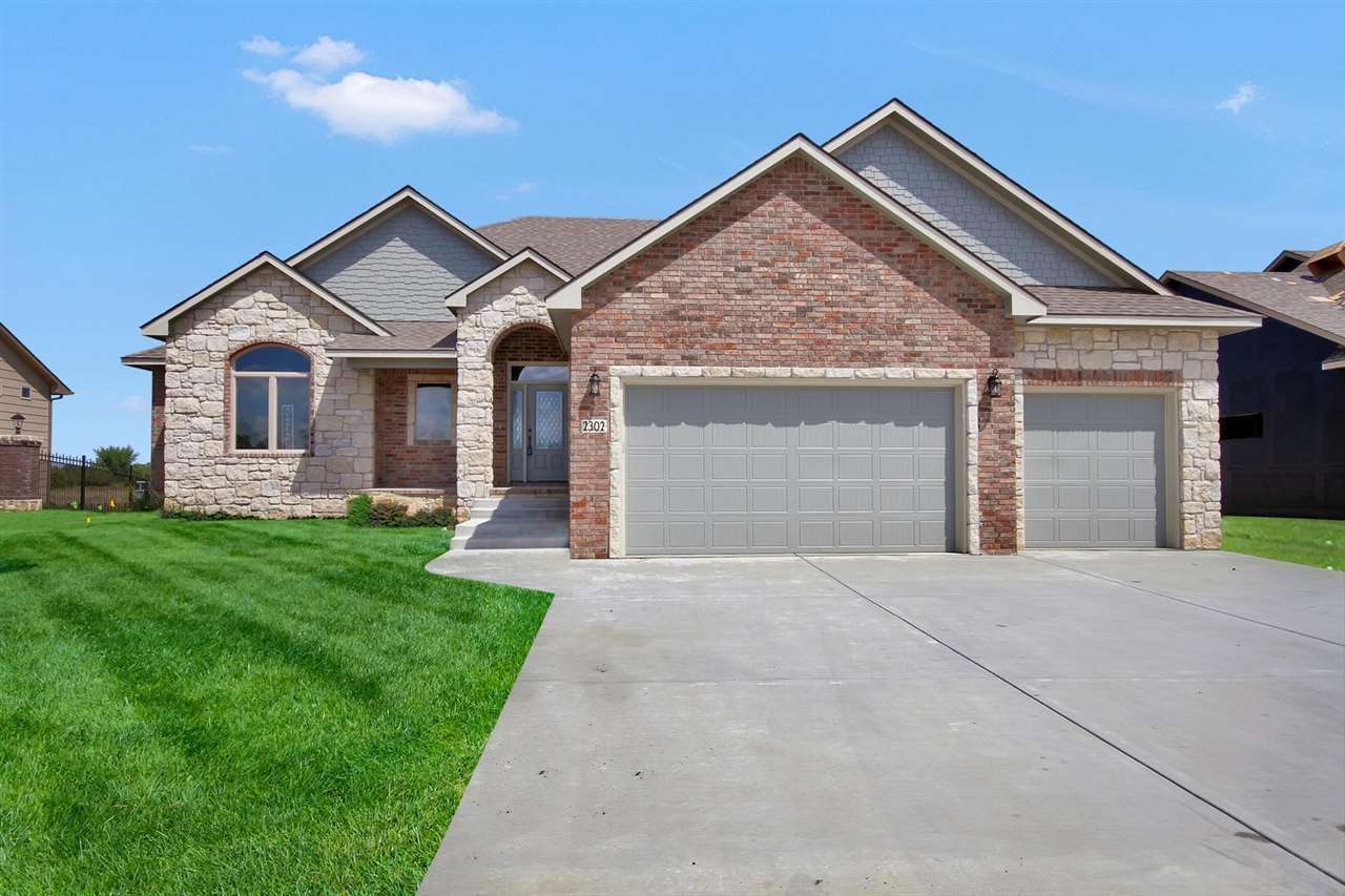 *AS OF 7/16/18 BUILDER TO INCLUDE LANDSCAPING PACKAGE WORTH $4000.00 WITH A FULL PRICE OFFER,  CALL LISTING AGENT FOR DETAILS.*                        Nice split bedroom concept with a total of six (6) bedrooms, 3 full baths, 2 family rooms & custom Wet bar. Main floor has tall ceilings, wood floors on entire main living area. Full finished view-out/walkout basement has lots of finished area. Garage includes garage door opener, sprinkler system, sod, and well included in price already. Very low special taxes at only approx. $85 a month. HOA includes swimming pool & playground.