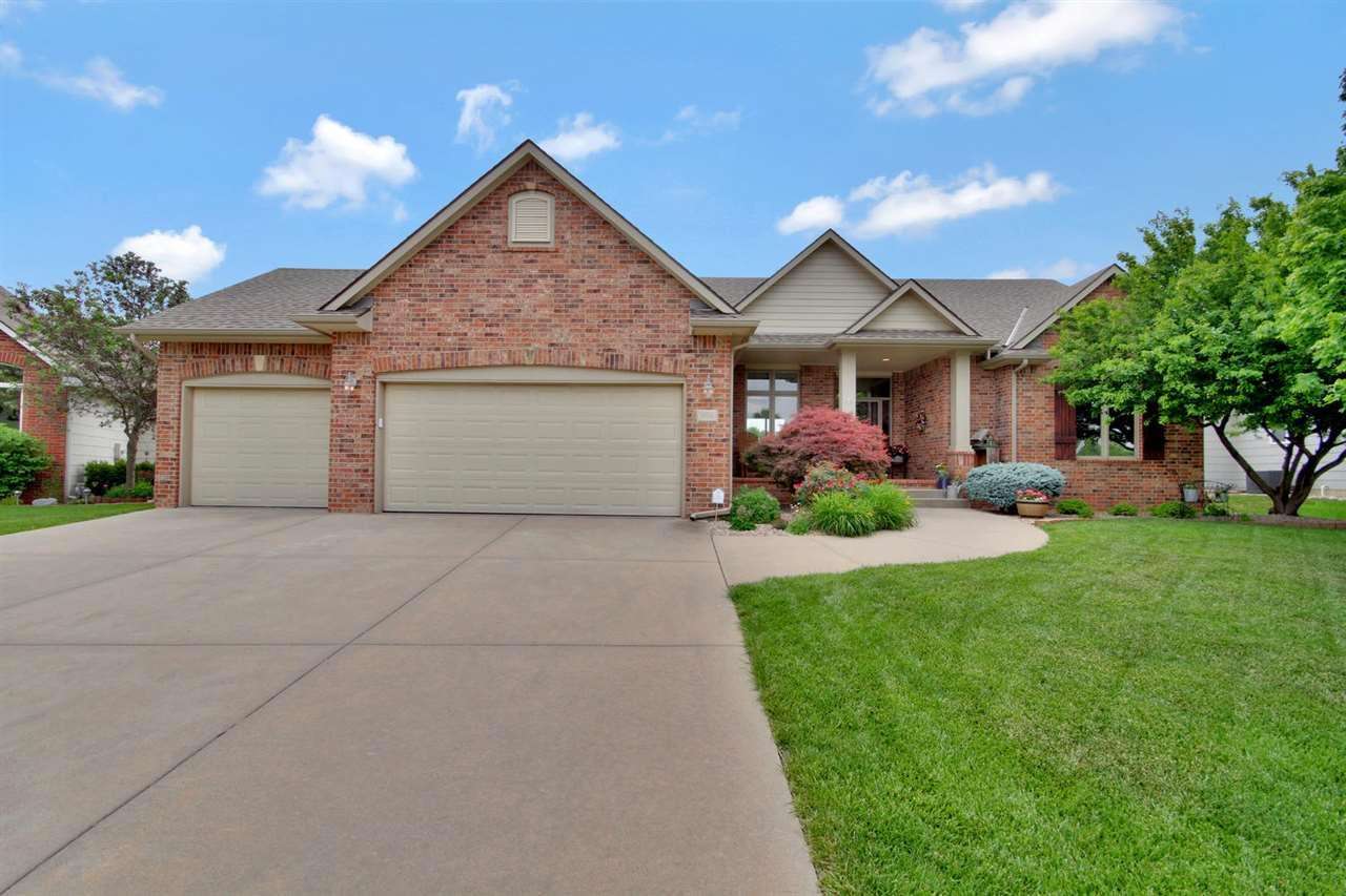 This beautiful custom built Auburn Hills home sits on the golf course, with impressive views of the 9th fairway.  The home is  located in a quiet cul-de-sac.  The landscaping is beautiful and well maintained. The specials are paid off, which is a great plus.  You will feel like you are on vacation when you enter this home.  A wall of windows provides lots of natural light to the  kitchen, Family room and Formal Dining room. The Family Room has a fireplace which is perfect for family time.  The kitchen has been completely remodeled!  It comes with all new appliances and with new granite counter tops and an eating bar. The kitchen has a dining area and a large walk-in pantry. The finished  basement has a large Family room, Fireplace and a Wet Bar!    Lots of room to entertain. The basement also has room for a pool table and or a place for your exercise equipment. There are also, two more bedrooms and a full bath. One of the bedrooms can also be used as an office.  Lots of built ins A must see!!! Seller is offering a $3000 allowance for carpet or deck improvements.  All this with great views of the golf course and desirable Goddard Eisenhower Schools. Don’t miss out on this exquisite home - Call to schedule your private showing today!!