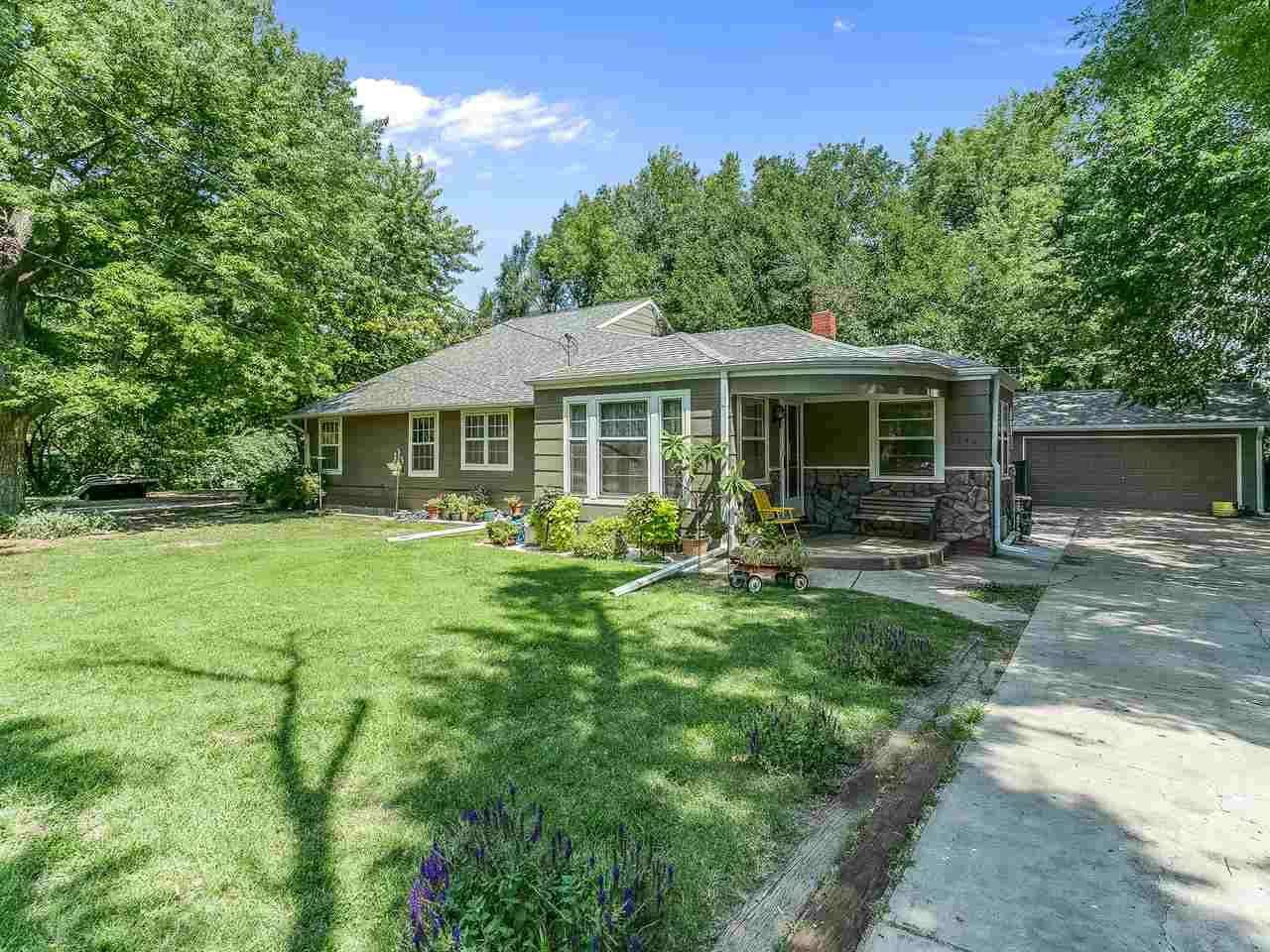 Country Living in the City!!  WOW, 6 bedrooms, 4 bathrooms, 2 car garage on over 1/2 acre surrounded