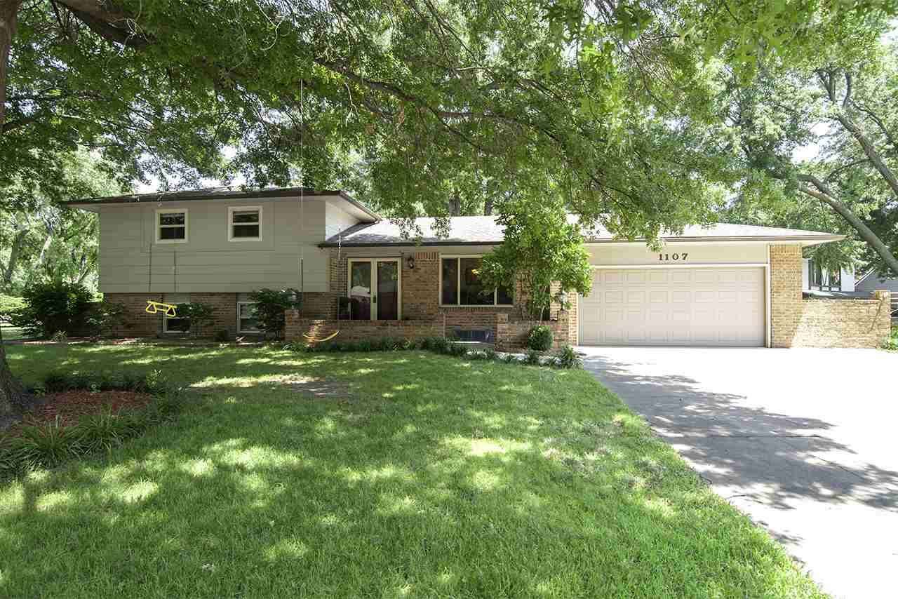 Beautiful home in the heart of Derby within an established neighborhood with mature trees and good n