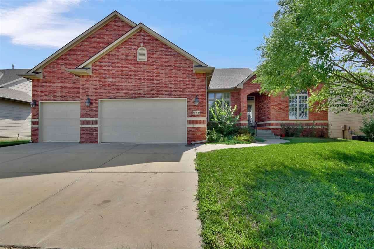 Price reduced!!! Wonderful custom built home in east Wichita with many upgrades! You are welcomed by