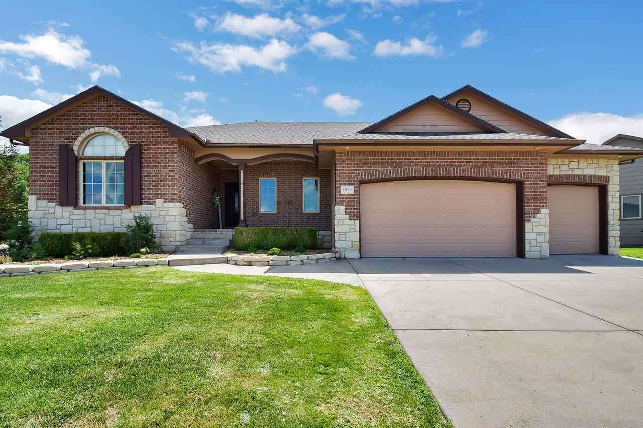 Welcome to 1056 N. Beau Jardin St.  One step in the door you will notice this one is different.  The
